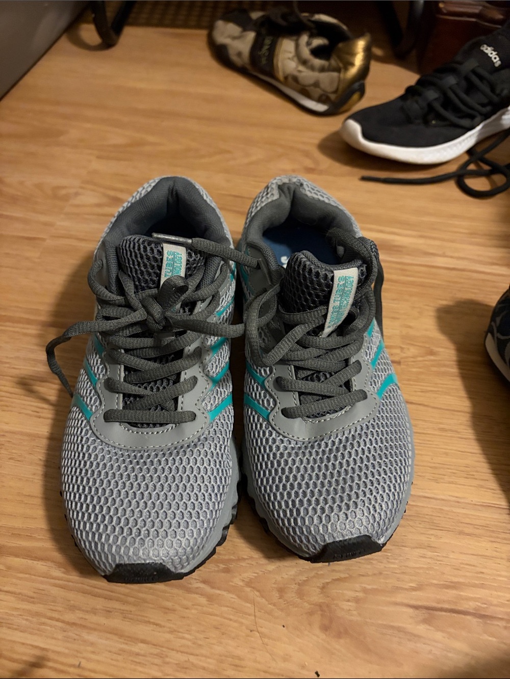 K-Swiss women’s Gray and Teal Mesh Sneakers